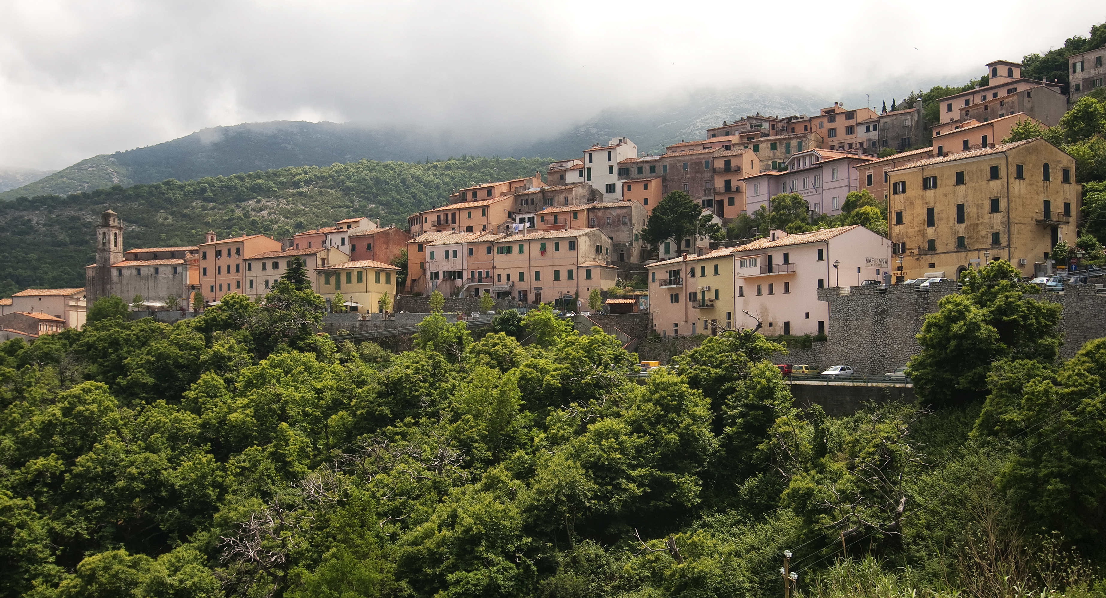 Beautiful view of historic houses on a hill in Elba, Italy